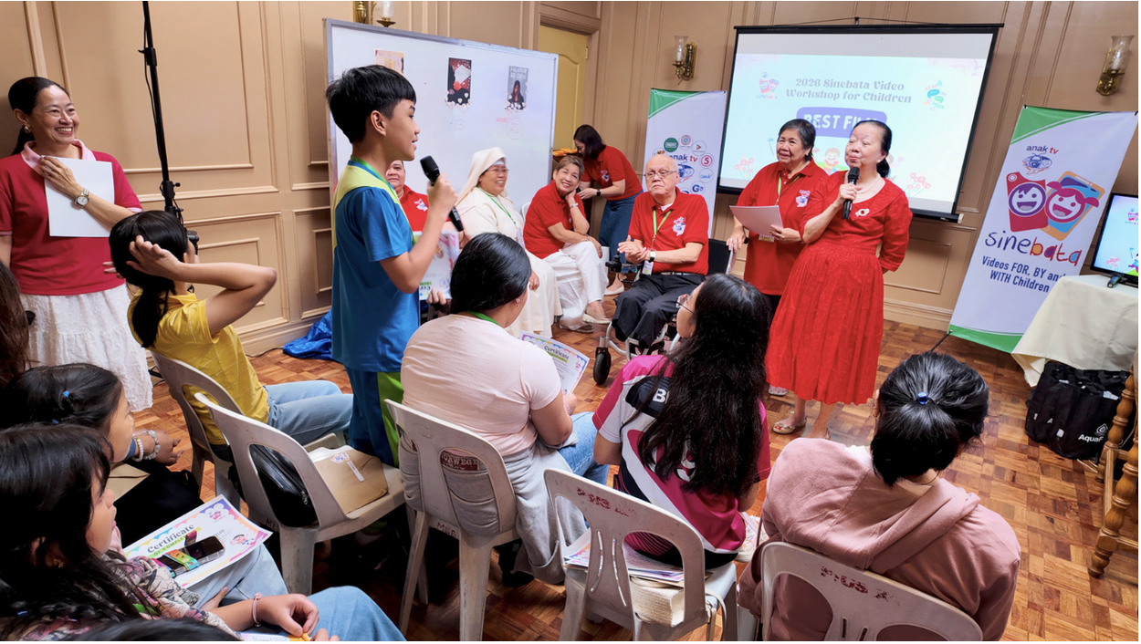 Ms. Elvira Yap Go engages one of the workshop